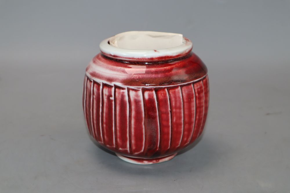 A David Leach fluted porcelain ox blood glazed vase, signed, with letter from David Leach, height 12cm